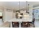 Modern kitchen with white cabinets and granite countertops at 1763 Oakland Rd, North Port, FL 34286