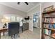 Home office with built-in shelving and desk at 1763 Oakland Rd, North Port, FL 34286