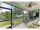 Relaxing screened porch overlooking the backyard at 1763 Oakland Rd, North Port, FL 34286