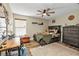 Cozy bedroom with cow print bedding and a ceiling fan at 18500 Ohara Dr, Port Charlotte, FL 33948