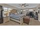 Main bedroom with large bed and a home office area at 18500 Ohara Dr, Port Charlotte, FL 33948