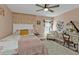 Charming bedroom with floral bedding and vanity area at 18500 Ohara Dr, Port Charlotte, FL 33948