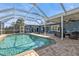 Expansive pool and patio area with seating at 18500 Ohara Dr, Port Charlotte, FL 33948