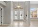 Spacious entryway with double doors and tile floor at 201 Champion St, Port Charlotte, FL 33953