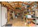 Well-lit workshop with ample storage shelving and workbenches at 201 Champion St, Port Charlotte, FL 33953