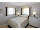 Cozy bedroom with a double bed and plenty of natural light at 21094 Edgewater Dr, Port Charlotte, FL 33952