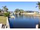 Peaceful waterfront view with neighboring homes and boats at 21094 Edgewater Dr, Port Charlotte, FL 33952