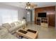 Living room with two sofas, coffee table, and wood accent wall at 21094 Edgewater Dr, Port Charlotte, FL 33952