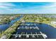 Community featuring a marina and waterfront homes at 21391 Harborside Blvd, Port Charlotte, FL 33952