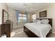 Bright bedroom with large window and a dresser at 21391 Harborside Blvd, Port Charlotte, FL 33952