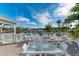 Spacious waterfront deck with ample seating for outdoor enjoyment at 21391 Harborside Blvd, Port Charlotte, FL 33952