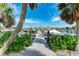 Private dock with boardwalk access to boats and waterfront views at 21391 Harborside Blvd, Port Charlotte, FL 33952