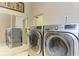 Laundry room with LG washer and dryer at 21391 Harborside Blvd, Port Charlotte, FL 33952