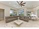 Living area features large sectional sofa and access to backyard at 21391 Harborside Blvd, Port Charlotte, FL 33952