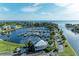 Community marina with clubhouse and numerous boat slips at 21391 Harborside Blvd, Port Charlotte, FL 33952