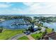 Aerial view of marina with numerous boats and waterfront homes at 21391 Harborside Blvd, Port Charlotte, FL 33952