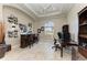 Home office features built-in shelving, desk, and wine storage at 21391 Harborside Blvd, Port Charlotte, FL 33952