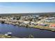 Aerial view of waterfront home with private pool and canal access at 217 W Tarpon Nw Blvd, Port Charlotte, FL 33952