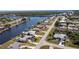 Bird's eye view of single-Gathering home on canal with pool at 217 W Tarpon Nw Blvd, Port Charlotte, FL 33952