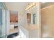 Bathroom with double vanity and access to bedroom at 217 W Tarpon Nw Blvd, Port Charlotte, FL 33952