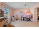 Serene bedroom featuring a covered piano and ample closet space at 217 W Tarpon Nw Blvd, Port Charlotte, FL 33952