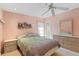 Bedroom with double bed and ceiling fan at 217 W Tarpon Nw Blvd, Port Charlotte, FL 33952