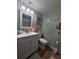 Updated bathroom with a white vanity and a shower at 2290 Aaron St # 302, Port Charlotte, FL 33952