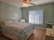 Bright bedroom with a king-size bed and large window at 2290 Aaron St # 302, Port Charlotte, FL 33952