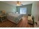 Bright bedroom featuring a king-size bed, and plenty of natural light at 2290 Aaron St # 302, Port Charlotte, FL 33952