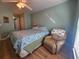 Bedroom with a queen bed and a comfy recliner at 2290 Aaron St # 302, Port Charlotte, FL 33952