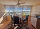 Bright dining area with table, chairs, and view at 2290 Aaron St # 302, Port Charlotte, FL 33952