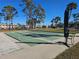 Shuffleboard courts with surrounding seating at 2290 Aaron St # 302, Port Charlotte, FL 33952