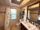 Well-lit bathroom with shower, toilet and vanity at 310 Belvedere Ct, Punta Gorda, FL 33950