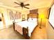 Charming bedroom with a wooden bed frame and unique wall art at 310 Belvedere Ct, Punta Gorda, FL 33950