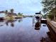 Serene canal view with boats docked along the waterway at 310 Belvedere Ct, Punta Gorda, FL 33950