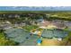 Community features tennis courts, pool, and clubhouse at 3191 Village Ln, Port Charlotte, FL 33953