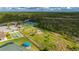 Community dog park with seating and shade at 3191 Village Ln, Port Charlotte, FL 33953