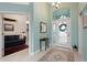 Bright entryway with tiled floor and decorative rug at 3191 Village Ln, Port Charlotte, FL 33953