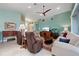 Living room boasts ample seating and a large TV at 3191 Village Ln, Port Charlotte, FL 33953