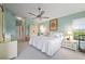 Main bedroom with king bed and views to the backyard at 3191 Village Ln, Port Charlotte, FL 33953