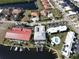 Wide aerial showcasing condo community by the water at 3216 Purple Martin Dr # 123, Punta Gorda, FL 33950