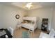 Bright bedroom with a bunk bed, a desk area, and decorative accents at 3216 Purple Martin Dr # 123, Punta Gorda, FL 33950