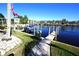 Private dock with walkway leading to the water at 3216 Purple Martin Dr # 123, Punta Gorda, FL 33950