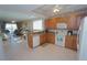 Kitchen with granite countertops and wood cabinets at 3216 Purple Martin Dr # 123, Punta Gorda, FL 33950