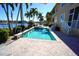 Inviting pool area with spa and brick pavers at 3216 Purple Martin Dr # 123, Punta Gorda, FL 33950