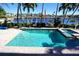 Community pool with spa and waterfront view at 3216 Purple Martin Dr # 123, Punta Gorda, FL 33950