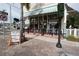 Street view of a storefront with outdoor seating at 3216 Purple Martin Dr # 123, Punta Gorda, FL 33950