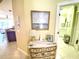 Small half bathroom with vanity and toilet at 3311 Wood Thrush Dr # 111, Punta Gorda, FL 33950