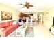 Bright living room features a comfortable sofa and open floor plan at 3311 Wood Thrush Dr # 111, Punta Gorda, FL 33950