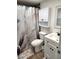 Clean bathroom with white vanity and updated fixtures at 4008 Oakview Dr # K3, Punta Gorda, FL 33980